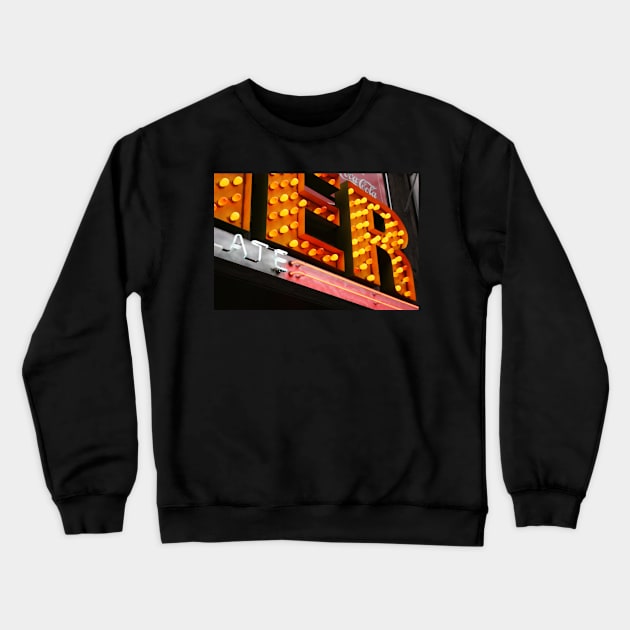 Storefront of a Diner, detail of light bulbs Crewneck Sweatshirt by Reinvention